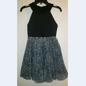 Girls size 8 short black leopard dress
